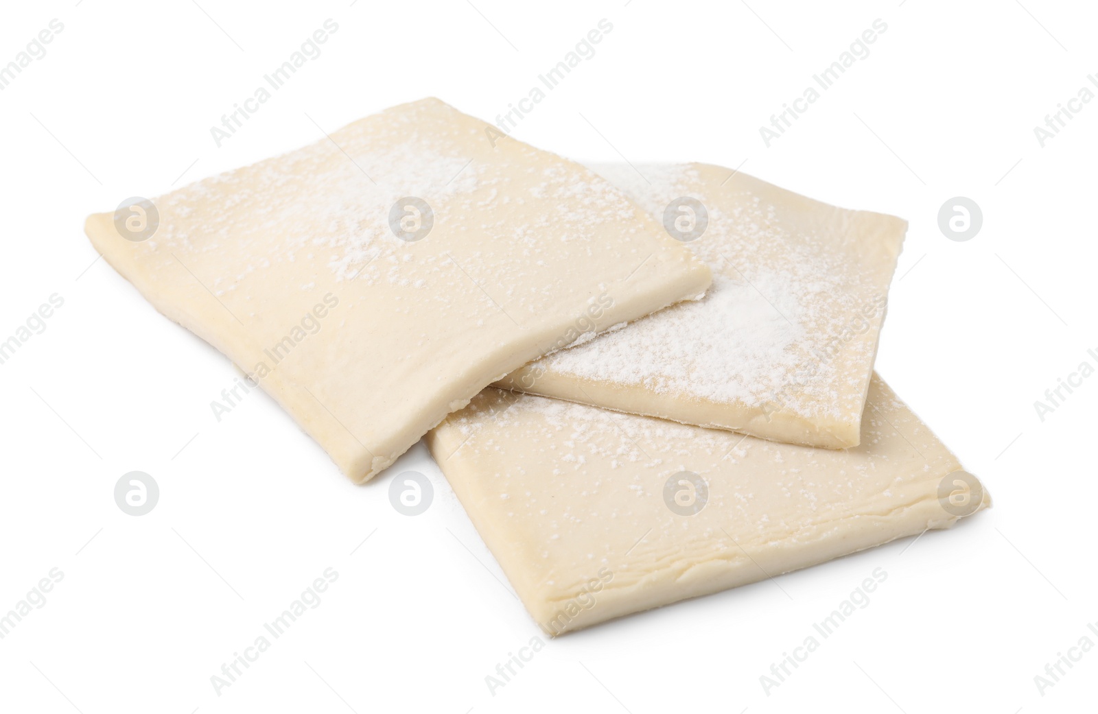 Photo of Raw puff pastry dough isolated on white