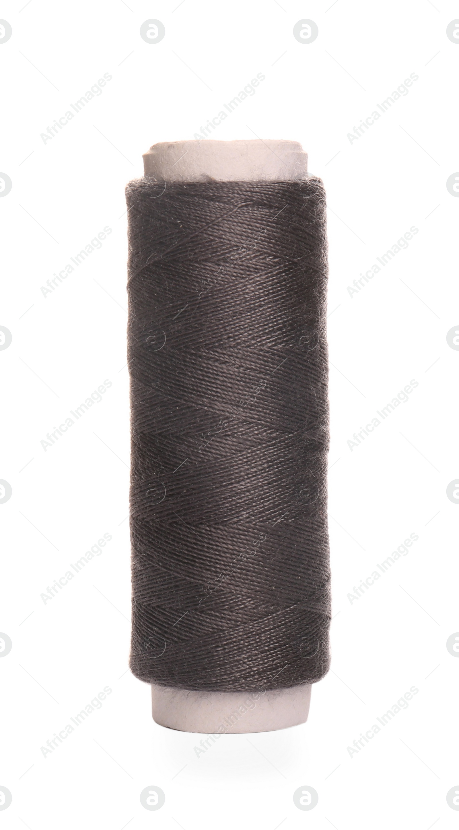 Photo of Spool of grey sewing thread isolated on white