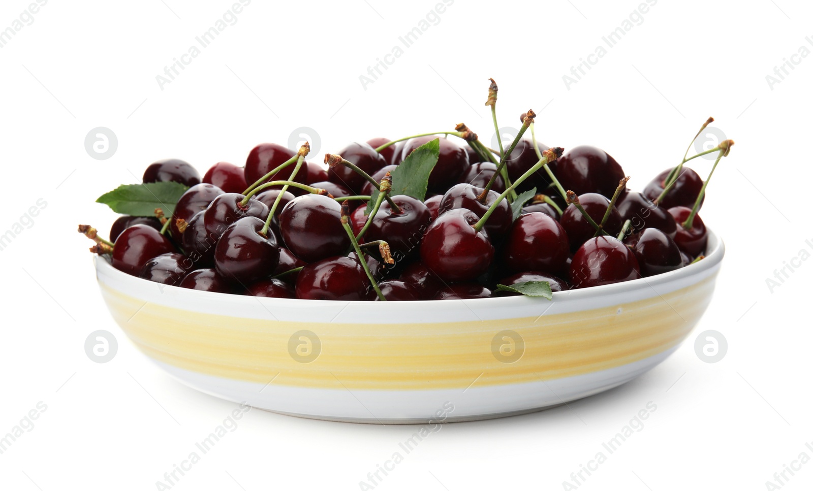 Photo of Plate with sweet red cherries on white background