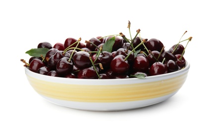 Plate with sweet red cherries on white background