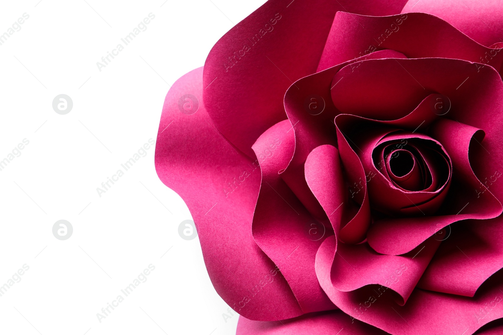 Photo of Beautiful red flower made of paper on white background, top view