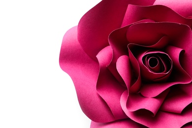 Photo of Beautiful red flower made of paper on white background, top view