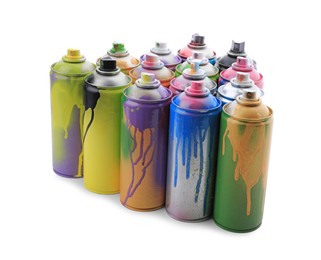 Photo of Used cans of spray paints on white background. Graffiti supplies