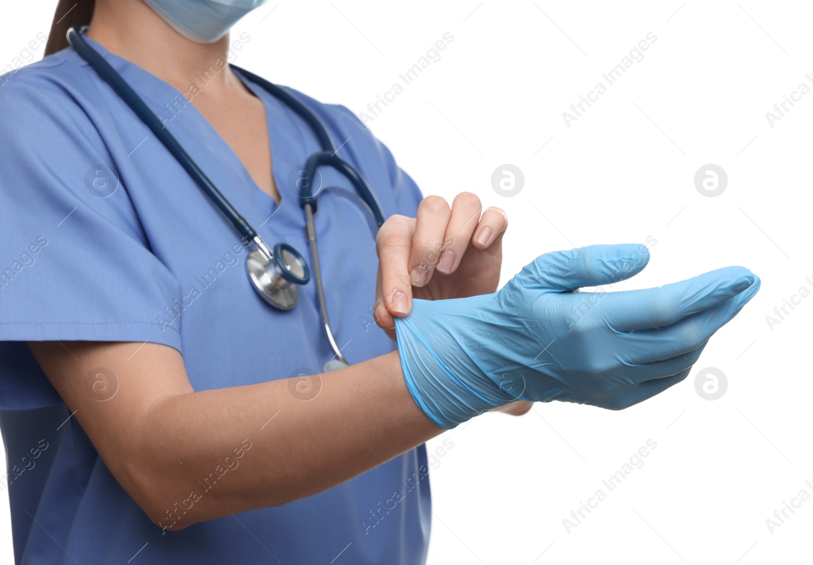 Photo of Doctor wearing light blue medical glove on white background, closeup