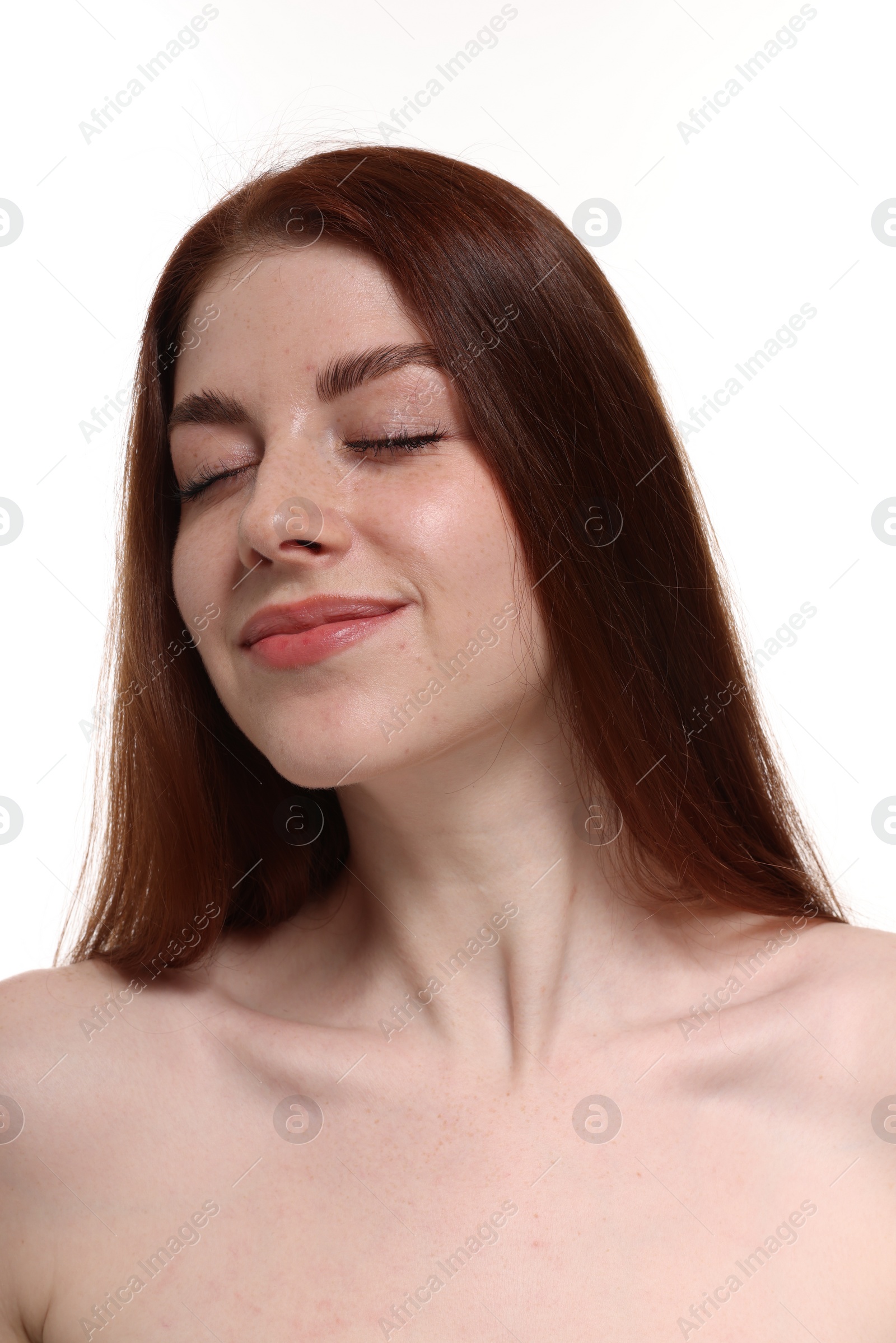 Photo of Portrait of beautiful woman with freckles on white background