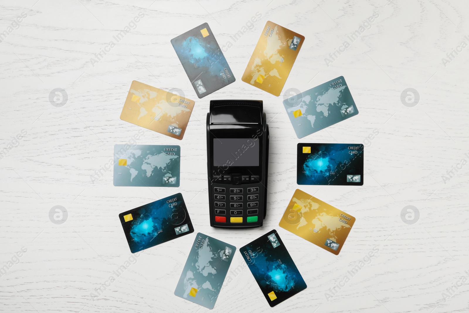 Photo of Flat lay composition with credit cards and payment terminal on white wooden background