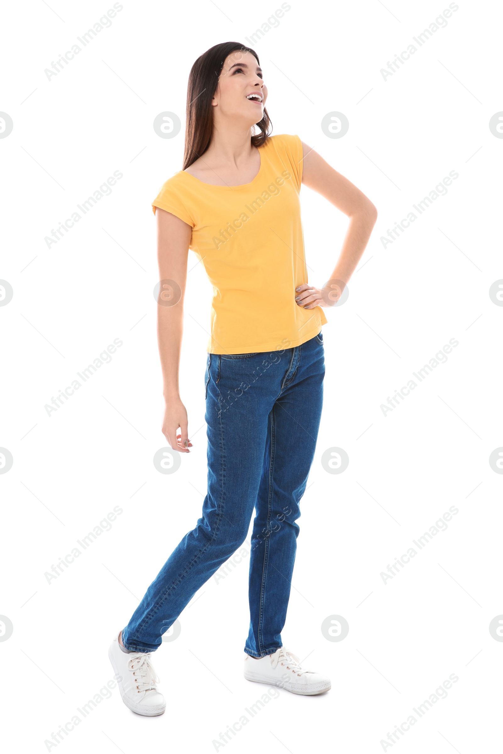 Photo of Beautiful young woman in stylish clothes on white background