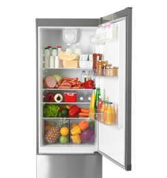 Photo of Open refrigerator with many different products on white background