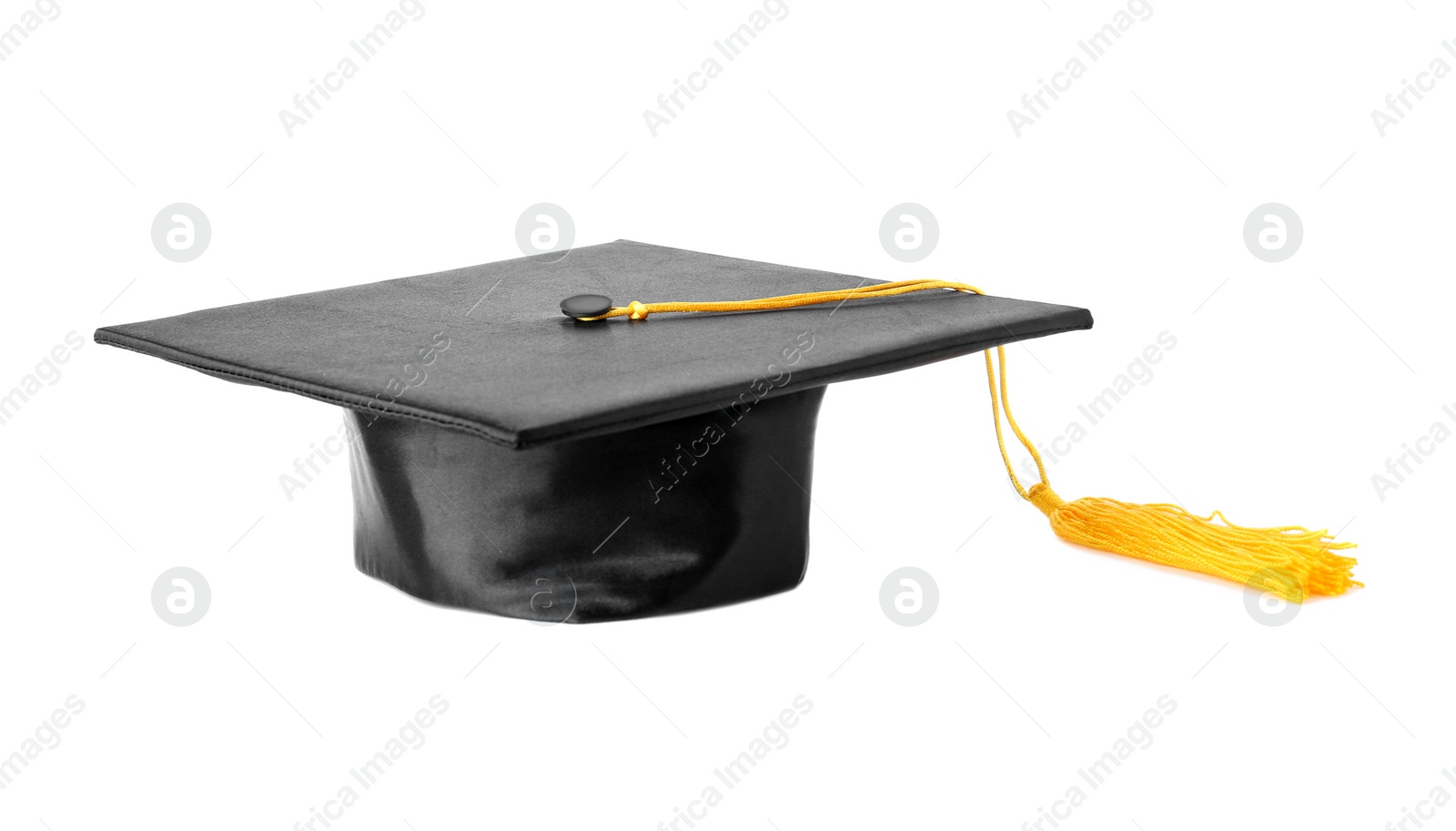 Photo of Graduation hat with gold tassel isolated on white