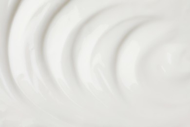 Photo of Delicious organic yogurt as background, top view