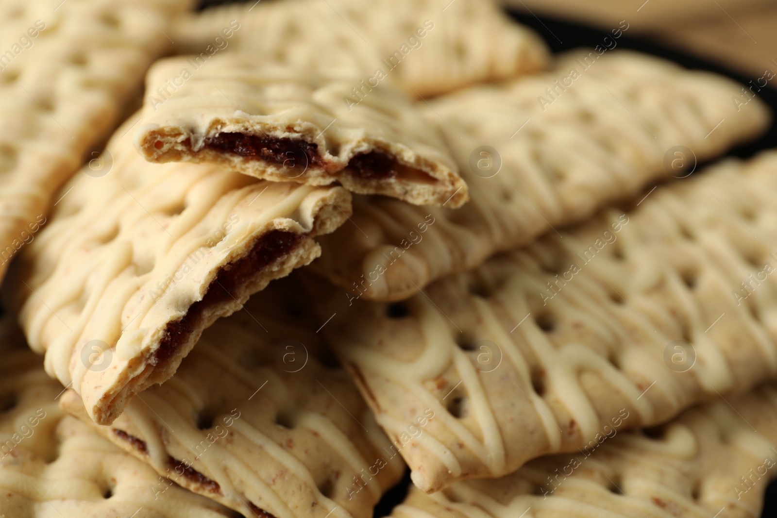 Photo of Tasty cookies with filling on table, closeup