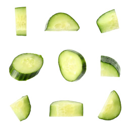 Image of Set of fresh cucumber slices on white background