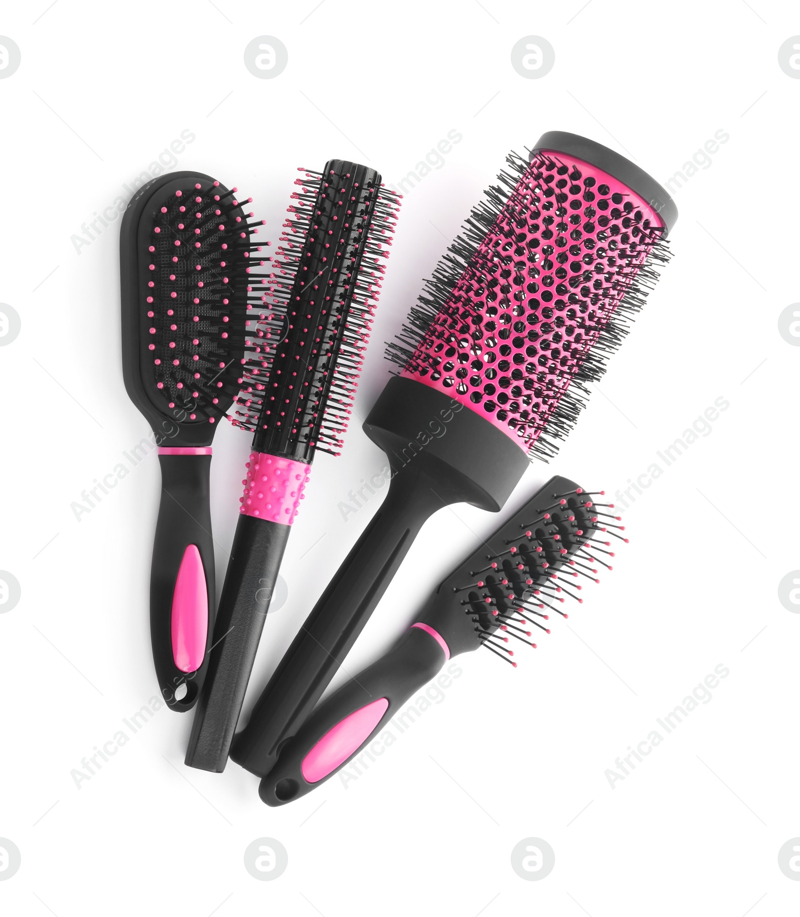 Photo of Set of professional hair brushes isolated on white