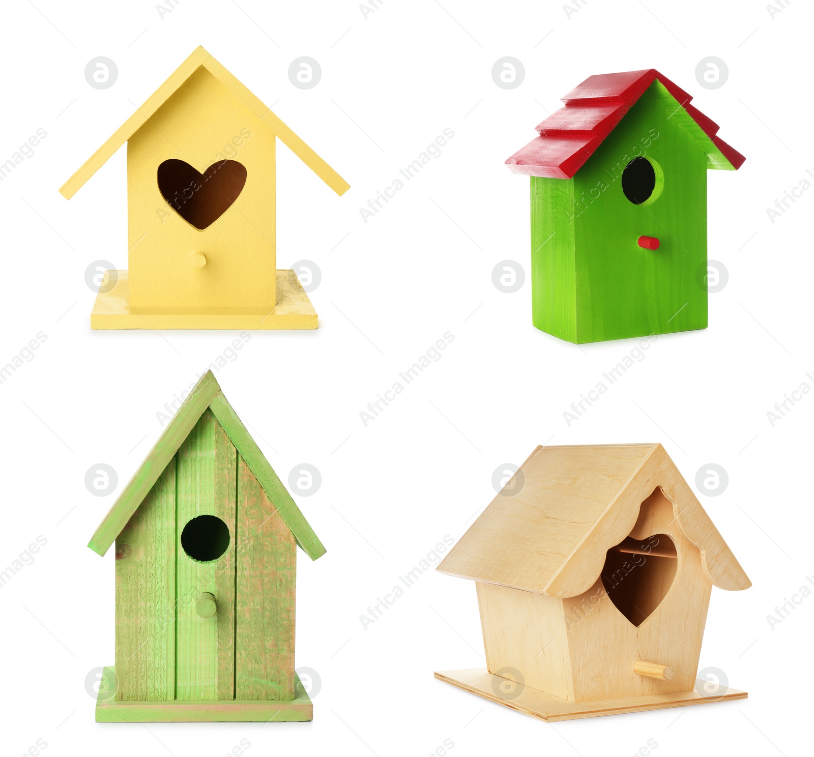 Image of Set with different beautiful bird houses on white background