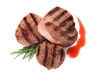 Photo of Delicious grilled meat with rosemary and sauce on white background, top view