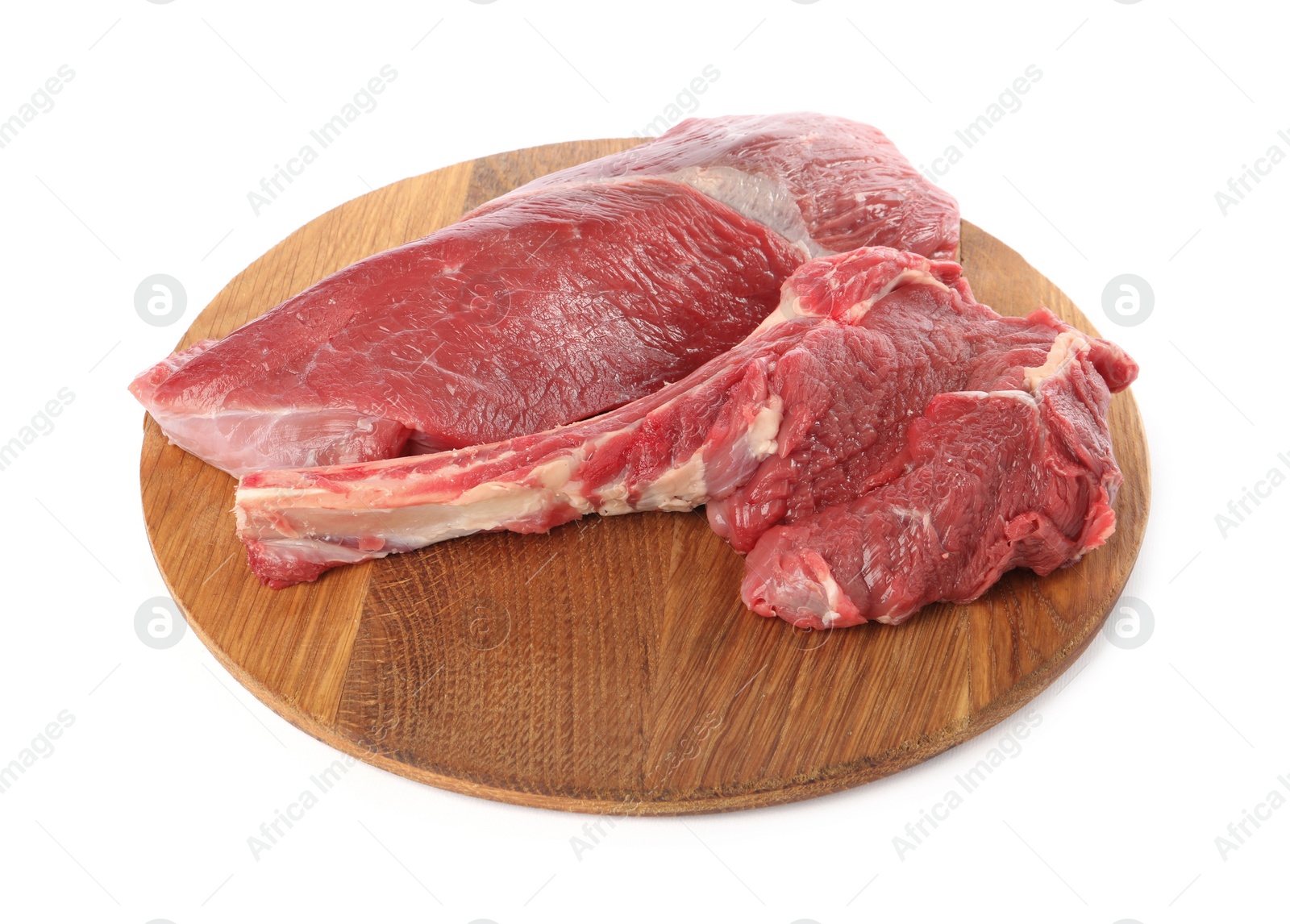 Photo of Board with pieces of raw beef meat isolated on white