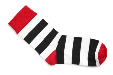 Photo of New striped sock on white background, top view