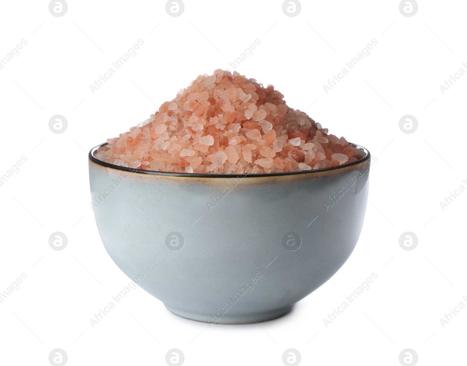 Photo of Pink himalayan salt in bowl isolated on white