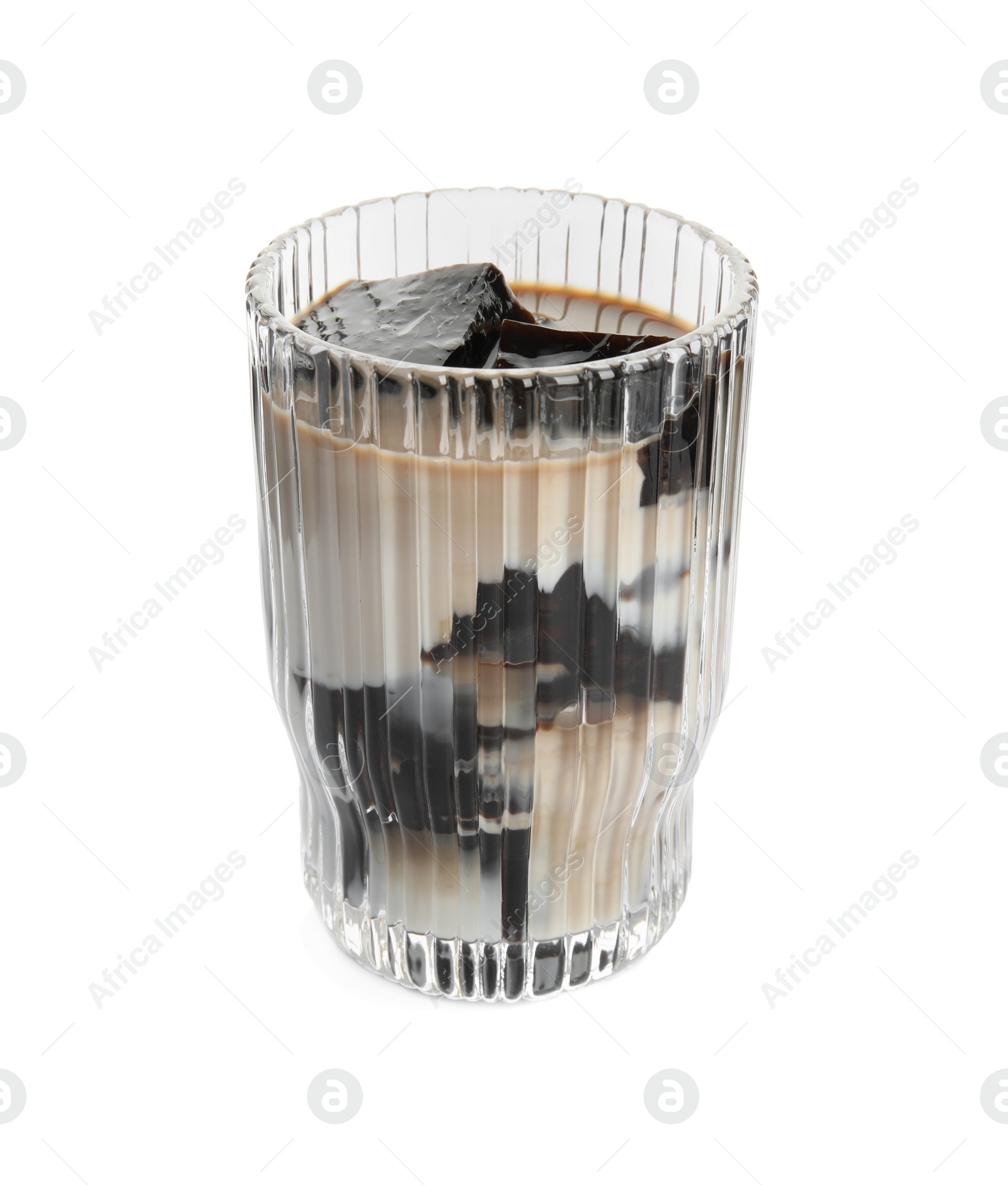 Photo of Glass of milk with grass jelly isolated on white