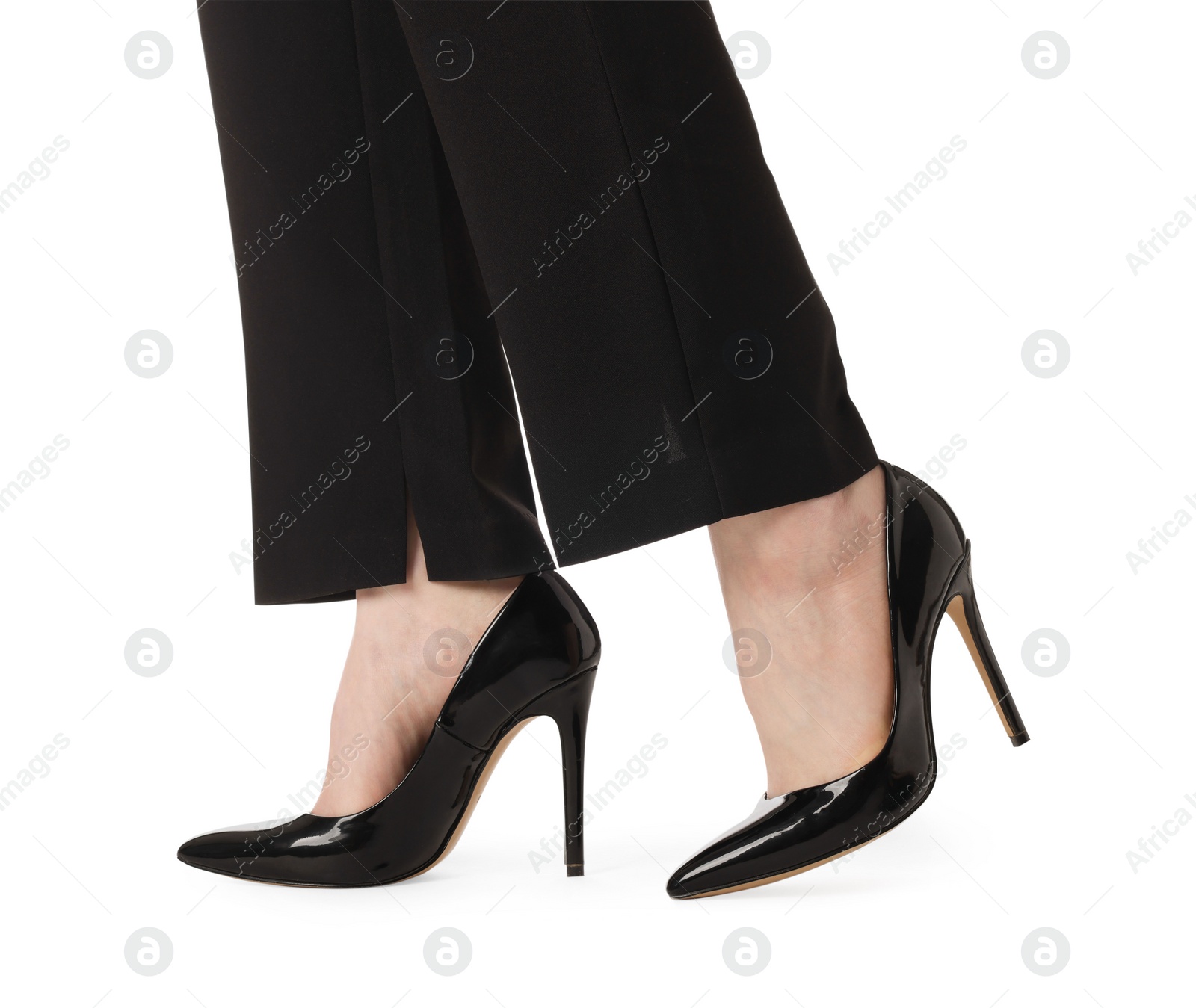 Photo of Businesswoman in leather shoes on white background, closeup