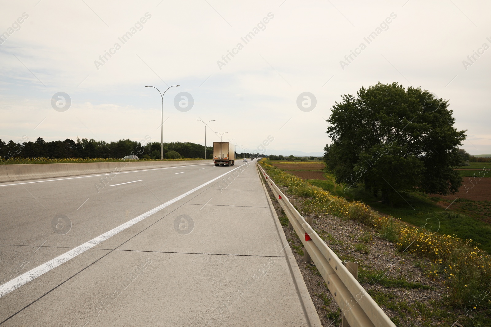 Photo of Picturesque view of asphalt road on cloudy day