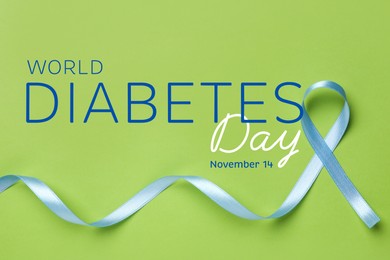 Image of World Diabetes Day. Light blue ribbon on green background, top view