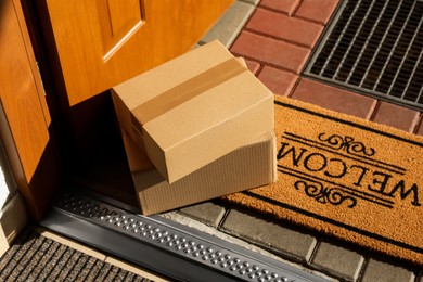 Photo of Stack of parcels delivered near front door