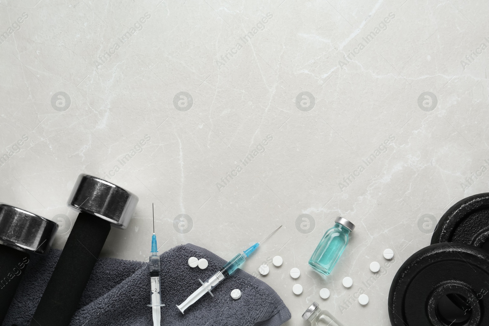 Photo of Different drugs and sports equipment on grey background, flat lay with space for text. Doping control