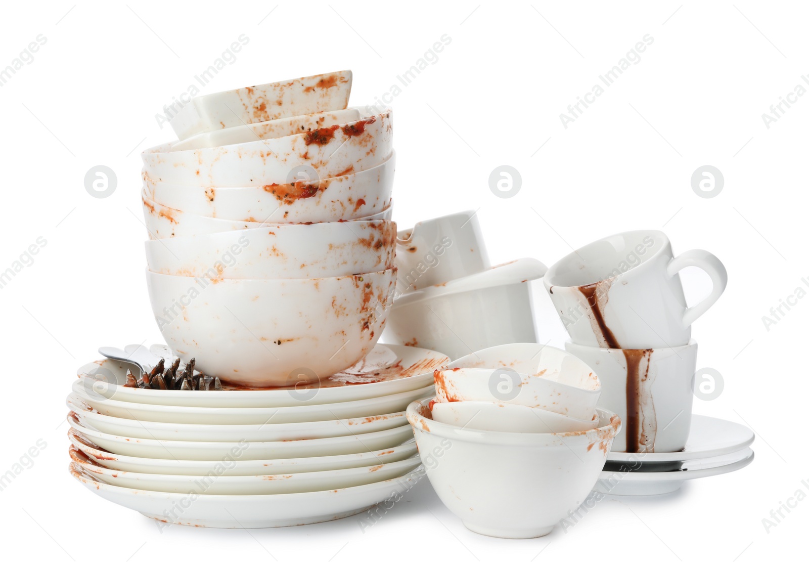 Photo of Set of dirty dishes isolated on white