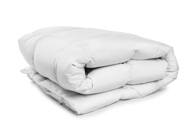 Photo of Folded clean blanket on white background. Household textile