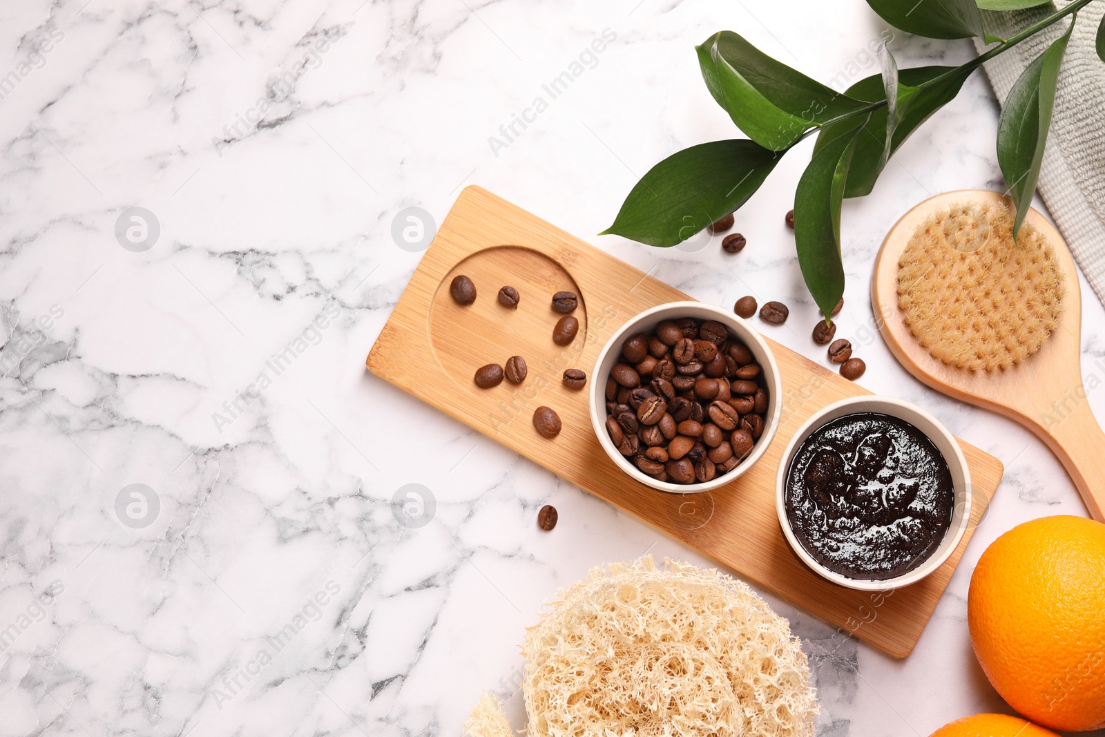 Photo of Flat lay composition with natural body scrub and fresh ingredients on white marble table, space for text. Anti cellulite treatment