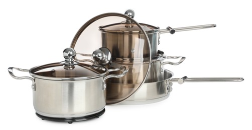 Photo of Set of stainless steel cookware on white background