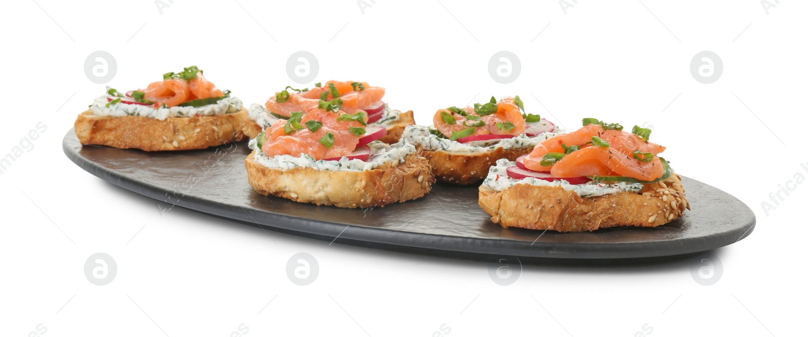 Photo of Tasty canapes with salmon, cucumber, radish and cream cheese isolated on white