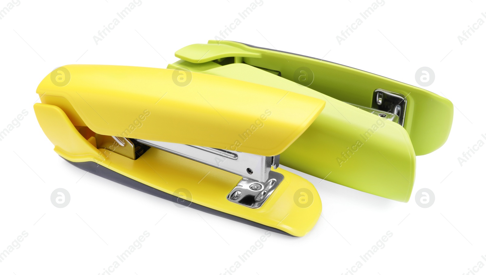 Photo of Two new bright staplers isolated on white