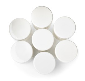 Photo of Portion jars for yogurt maker on white background, top view
