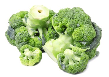 Photo of Pile of fresh raw green broccoli isolated on white