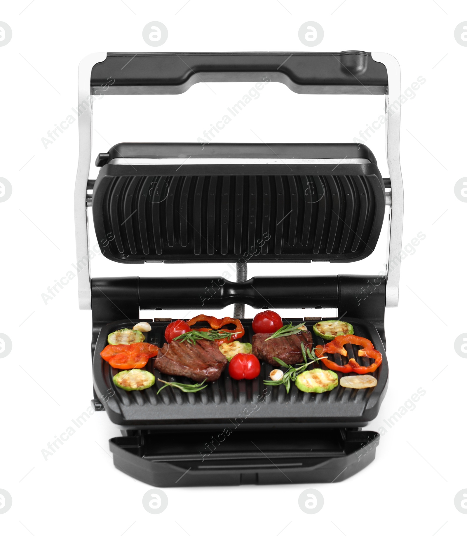 Photo of Electric grill with tasty meat, rosemary and vegetables isolated on white