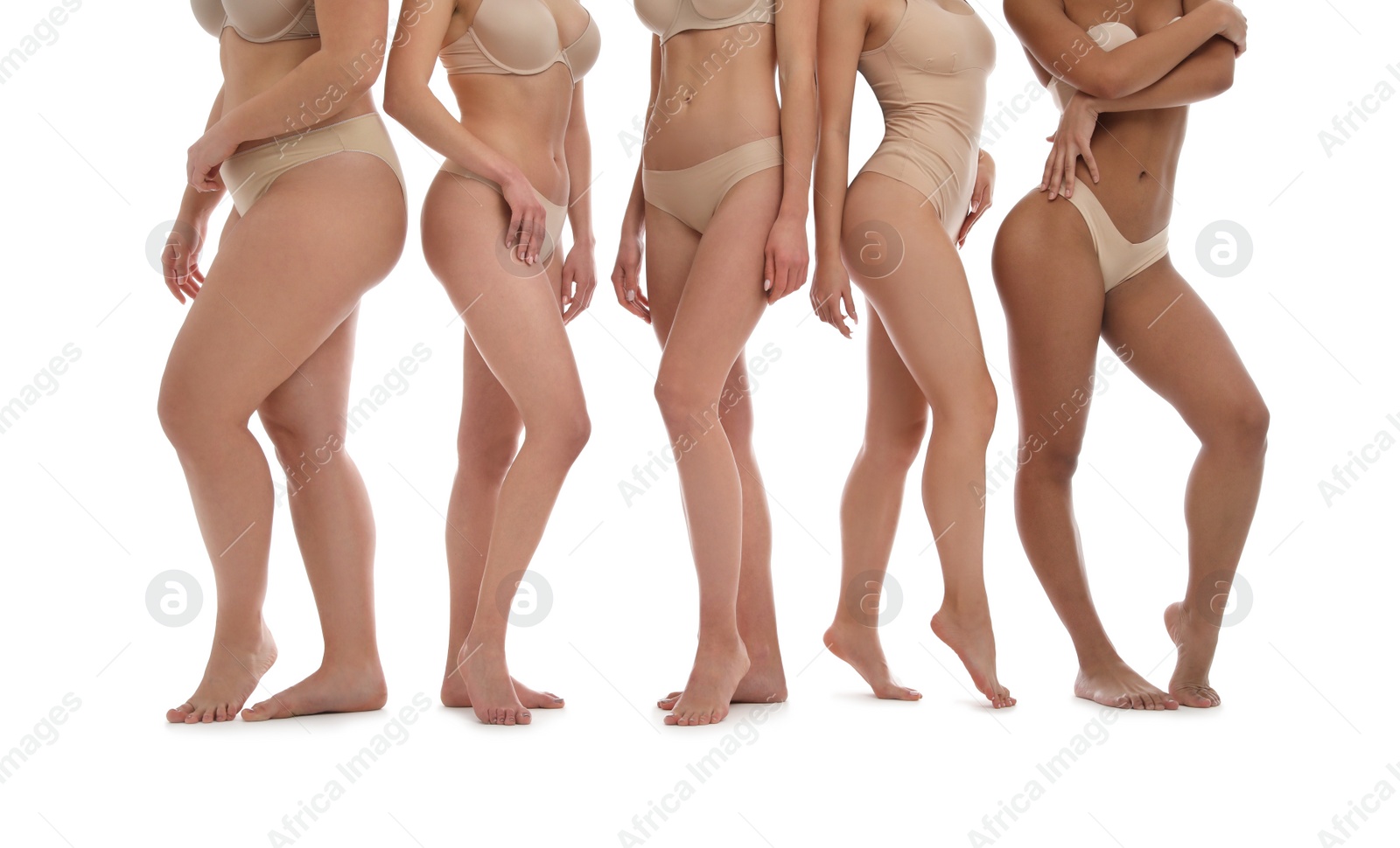 Photo of Group of women with different body types in underwear on white background, closeup