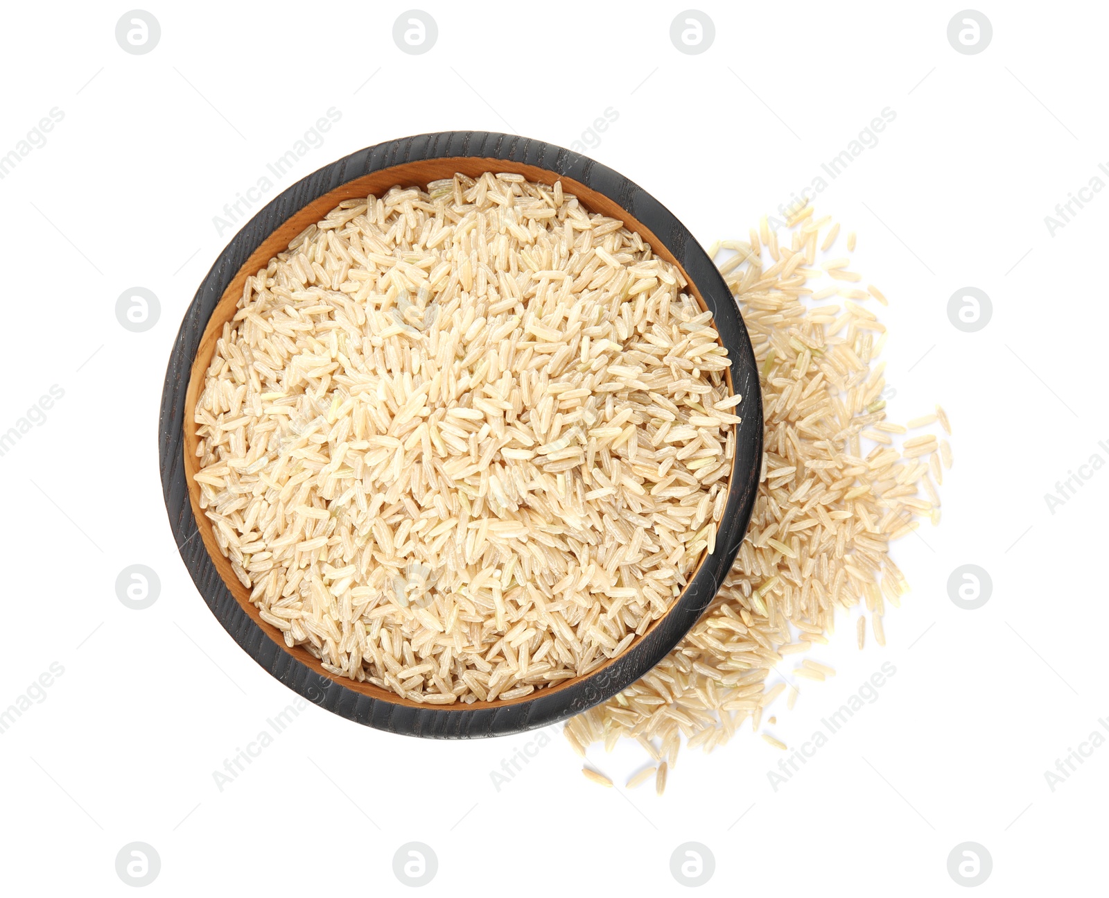 Photo of Plate with raw unpolished rice on white background, top view