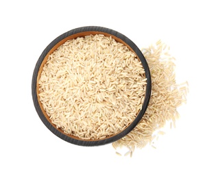 Photo of Plate with raw unpolished rice on white background, top view