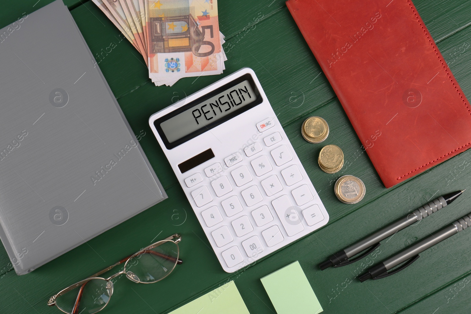 Image of Calculator with word Pension, money, glasses and stationery on green wooden table, flat lay