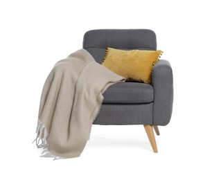 Photo of One grey armchair with pillow and blanket isolated on white