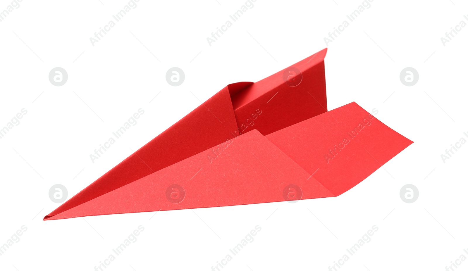 Photo of Handmade red paper plane isolated on white