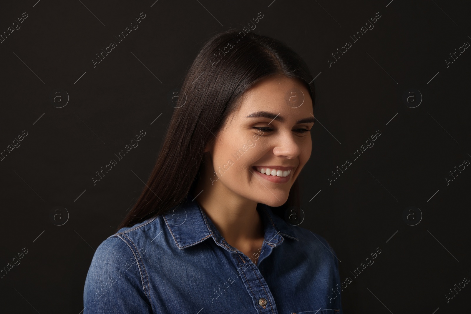 Photo of Personality concept. Emotional woman on black background