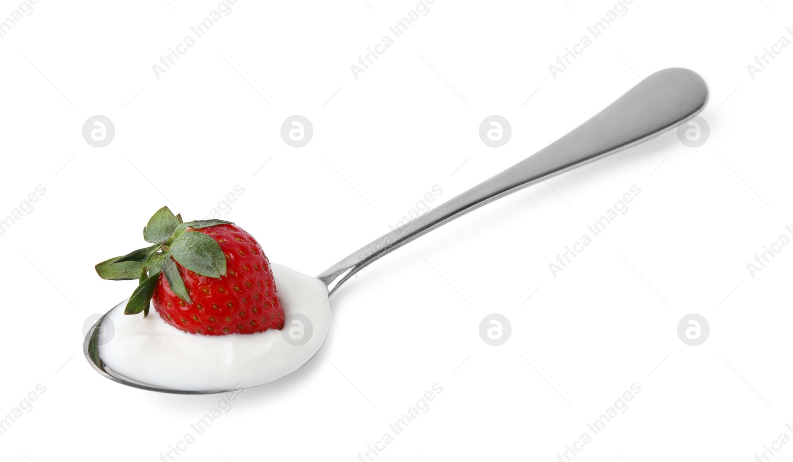 Photo of Spoon with yogurt and strawberry isolated on white