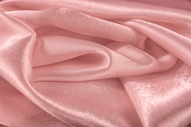 Photo of Texture of beautiful rose silk as background