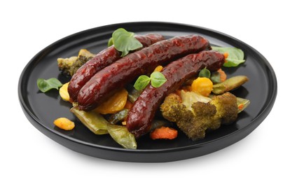 Delicious smoked sausages and baked vegetables isolated on white