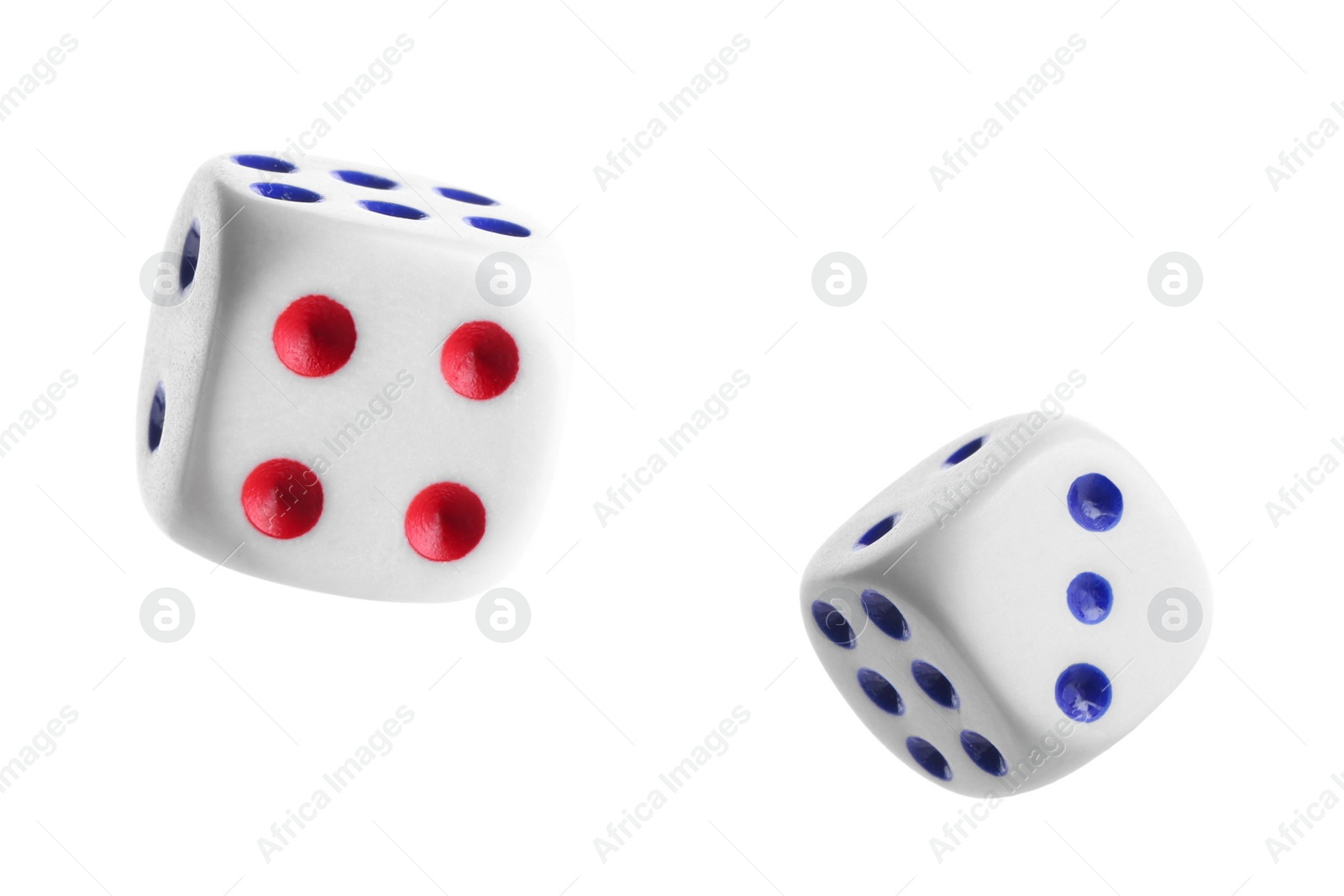 Image of Two dice in air on white background
