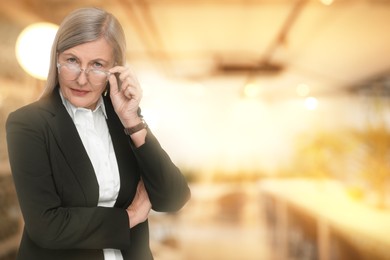 Image of Lawyer, consultant, business owner. Confident woman with eyeglasses indoors, space for text