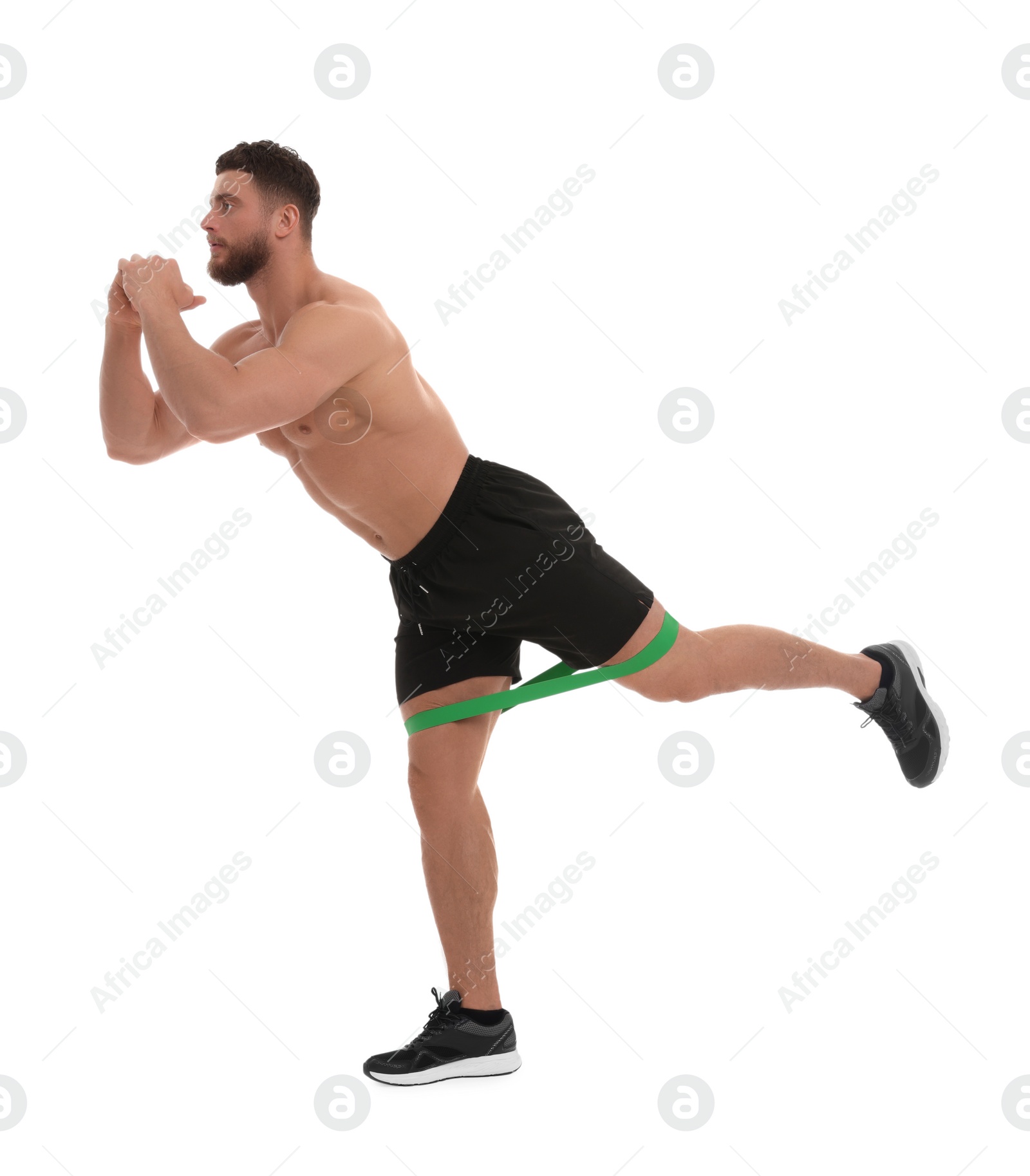 Photo of Young man exercising with elastic resistance band on white background